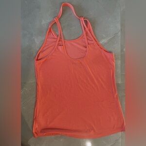 REEBOK Woman Tank Top Size Large Orange Color Racerback Reebok Logo on Back